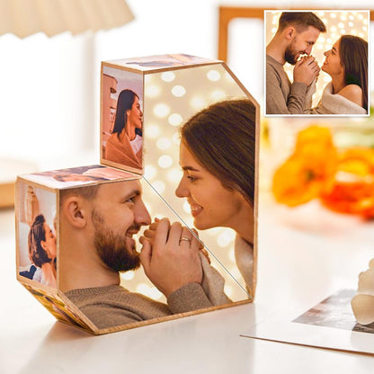 Customized hexagonal photo lamp featuring pictures of a couple, with a warm glowing light and a blurred background of a cozy room.