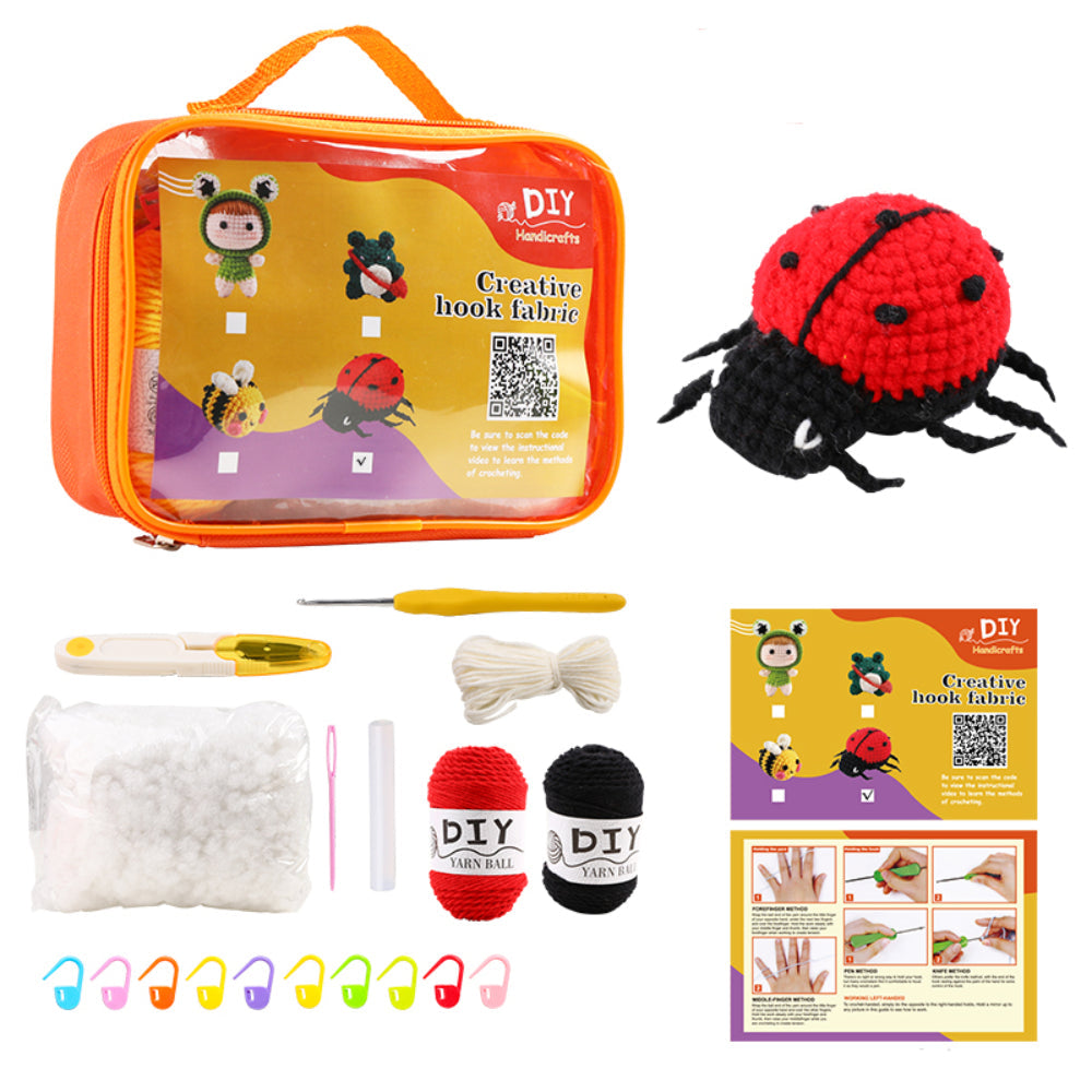 Alt text: DIY crochet kit with yarn, hooks, and accessories displayed around a transparent, orange-zippered case. Finished crocheted ladybug included, along with instructional pamphlets.